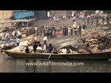Boat ride on river Ganges to see cremation ghats of Varanasi
