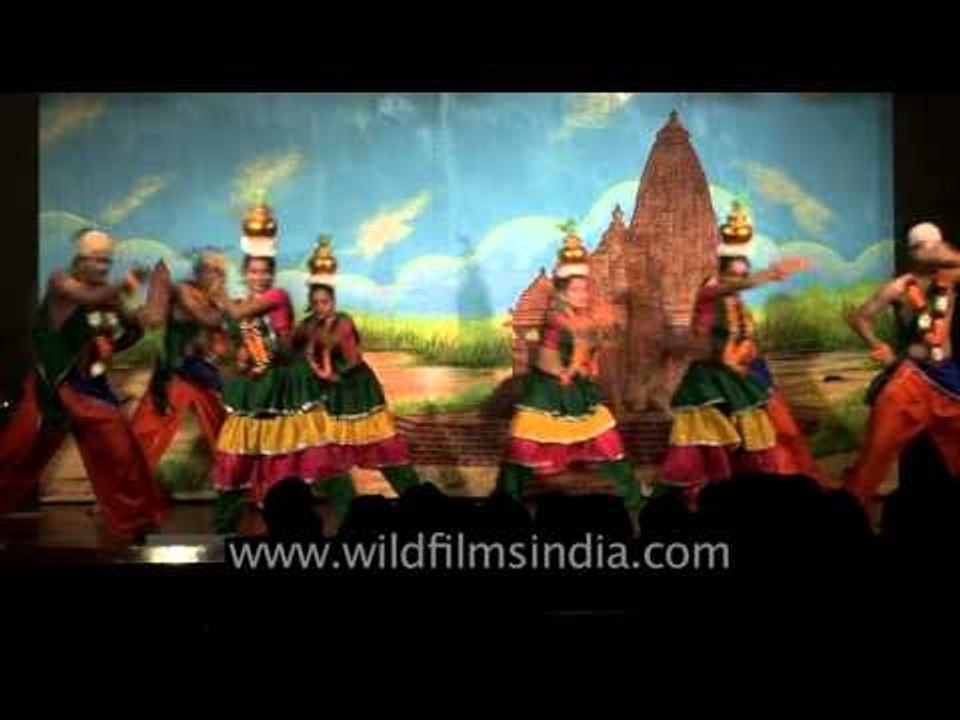 Tamilian dance performers dance with pots mounted on their heads