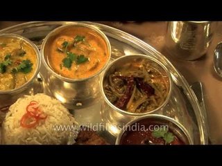 Gujarati cuisine being served at a restaurant in Bhuj, Gujarat