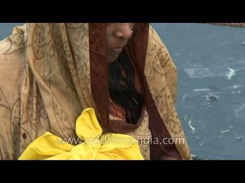 Sun worshippers offer prayers during Chhath puja in Delhi