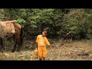 Boy fetching water from Aglar River