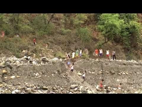 Villagers rush down the hills for Maund Mela