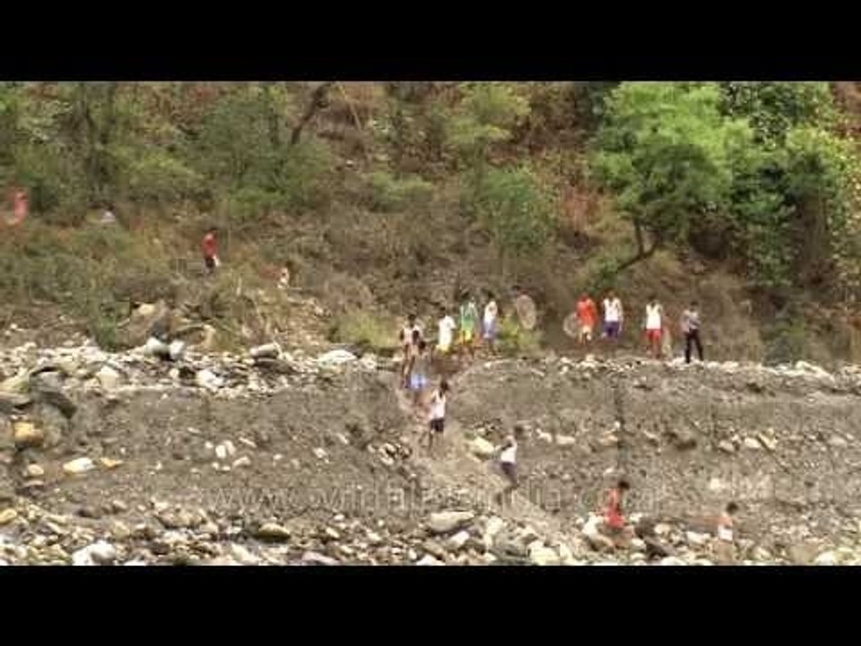 Villagers rush down the hills for Maund Mela