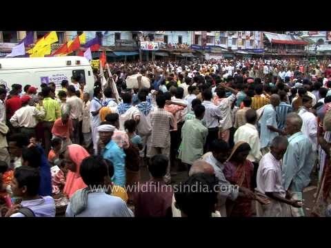 Crowds rally around the chariots during Jagannath Rath Yatra in Puri