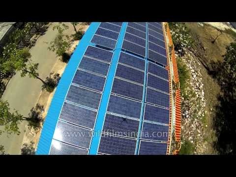 Roof-top solar energy harvesting through panels at Buddhist temple, Nakhon Pathom