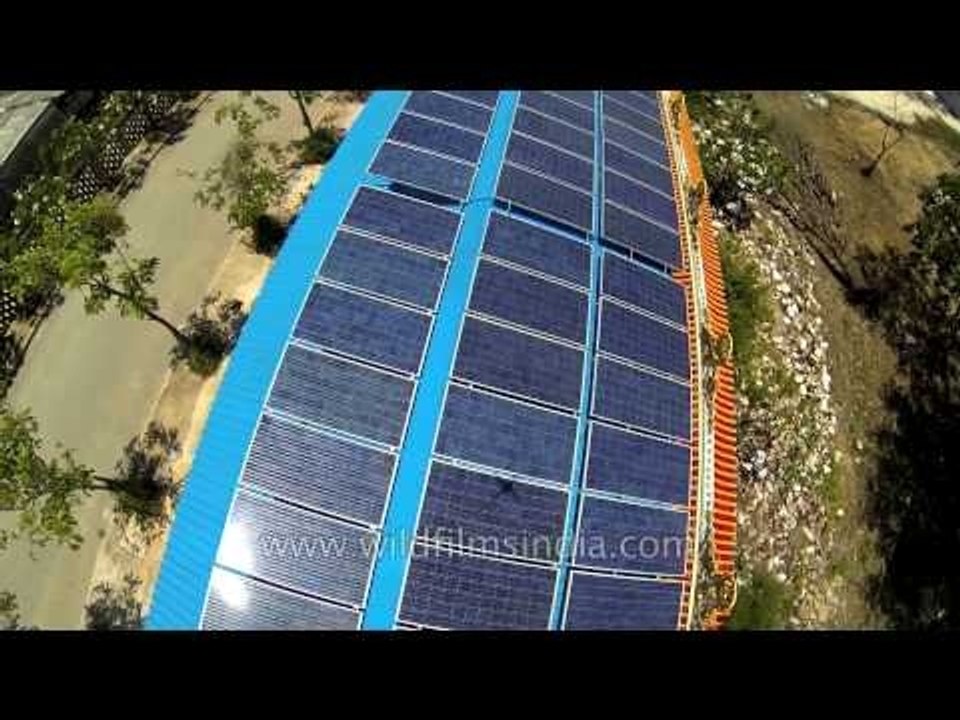 Roof-top solar energy harvesting through panels at Buddhist temple, Nakhon Pathom