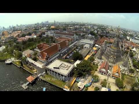 Aerial view of Wat Arun Temple along Chao Phraya River in Bangkok