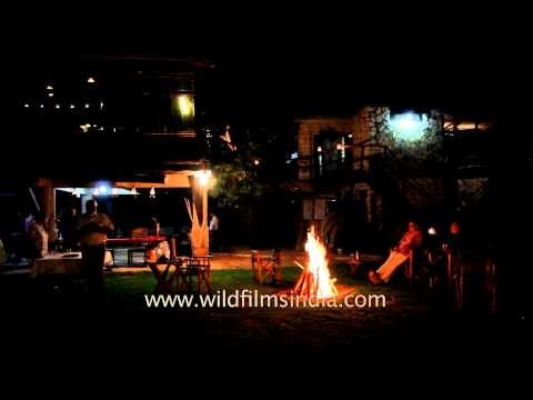 Guests gather for the bonfire at Ken River Lodge, Panna