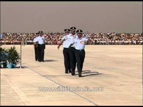 Indian Air Force officers march off wearing medals of honour