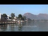 Lake Pichola surrounded by hills, palaces and temples: Udaipur