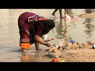 Preparations before worshipping alongside Ganga in Varanasi