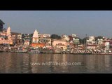 Rowing boat on the holy ghats of Ganges in Varanasi