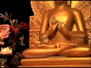 Statue of a golden Buddha at Sarnath, India