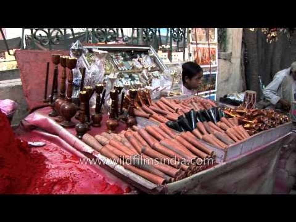 Vermilion, hookah pot and chillum pipe for sale at the street market of