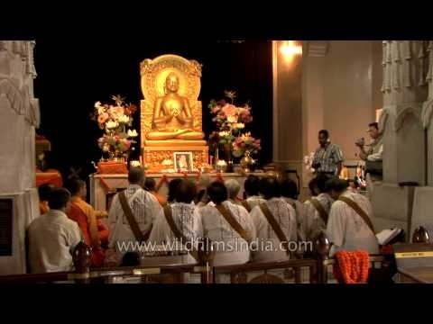 Devotees worship at the Mulagandhakuti Vihara Temple at Sarnath
