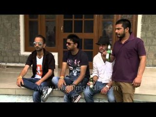 Men drinking Kingfisher beer at Himalayan Music Festival