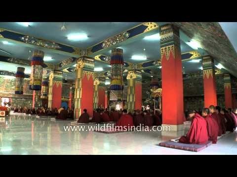 Monks gather for prayer at Padmasambhava shrine of Mindrolling Monastery