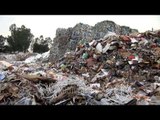 Compacted recyclable paper waste at a recycling plant in India
