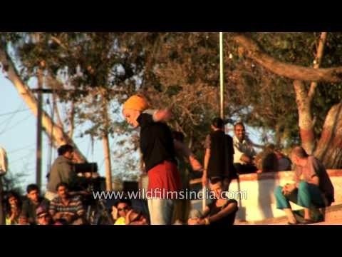 Tourist displays rope tricks at Jaipur Ghat - Pushkar