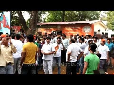 BJP supporters celebrate party's victory in the assembly elections