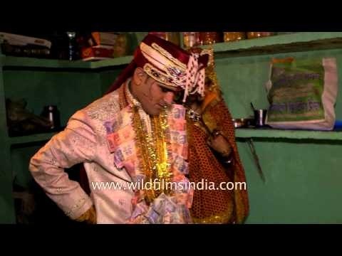 Newly-weds couple offering prayer after the griha pravesh : Kumaoni wedding