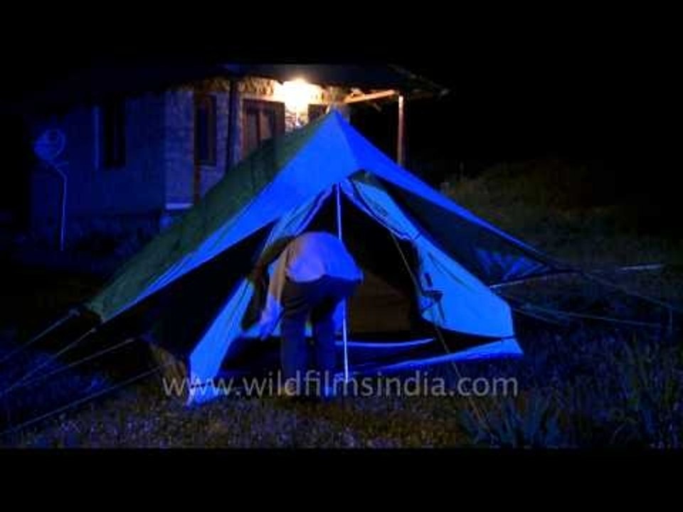 Setting up a tent on the ground at Himalayan Music Festival