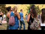 Women drinking Kingfisher beer at Himalayan Music Festival