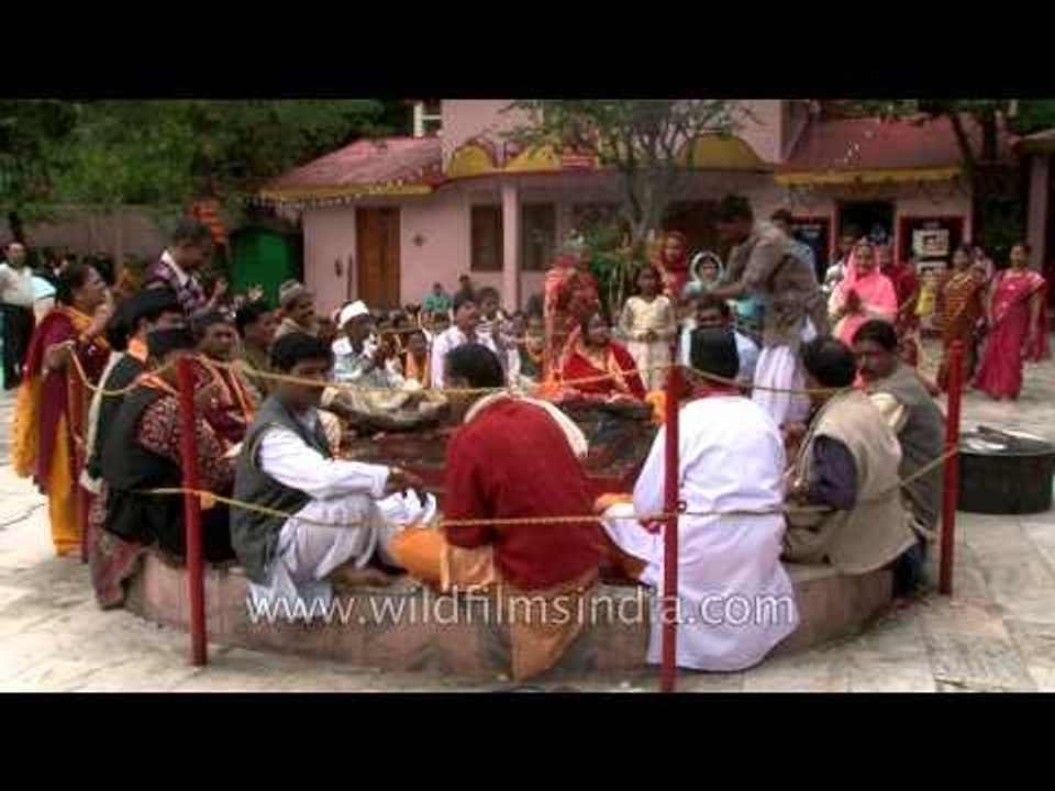 Devotees performing havan rituals at Naina Devi Temple, Nainital