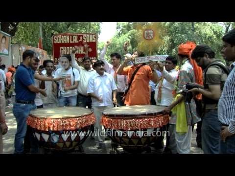 BJP supporters celebrate the election results outside the BJP office, Delhi