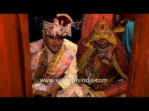 Newly-weds couple performing wedding rituals