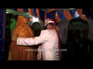 Kumaoni bride and groom taking the 'saatphere'