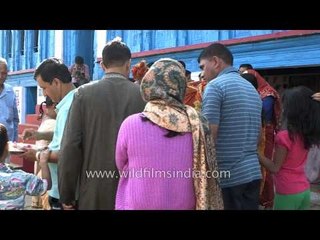 Pre-wedding rituals : Groom's brother shaving his hair