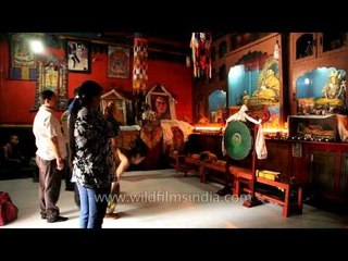 Devotees of Lord Bhuddha offering a prayer