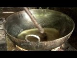 Frying Chandrakala (dessert) at a sweets shop in Varanasi