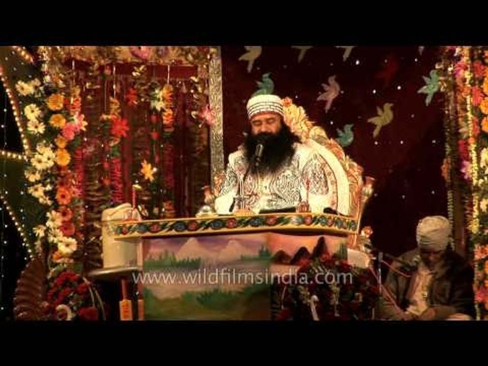 Ram Rahim Singh entertaining people through songs
