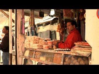 Souvenirs and prayer related items for sale near Badrinath Temple