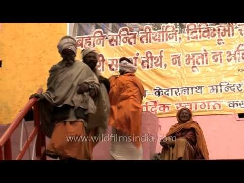 Pilgrims getting ready after a dip in Tapta Kund, Badrinath