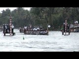 Oarsmen row their boat during the Nehru Trophy Boat Race in Alleppey