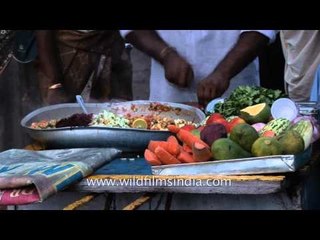 Sweet and spicy cocktail fruit salad on the streets of Kerela