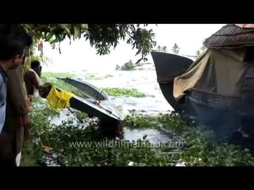 Dragging the Chundan Vallam in the backwaters of Kerala