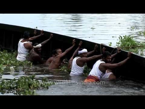 Traditional snake boat overturned at Punnamada Backwater, Kerala