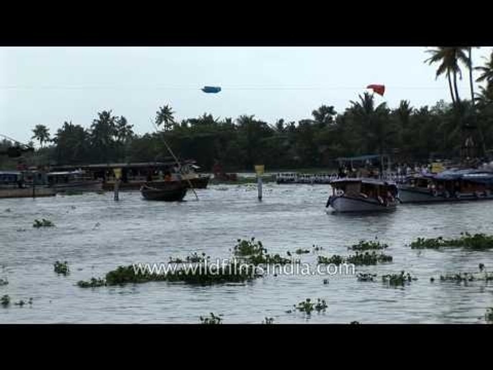 Participants compete in the Kerala Boat Race
