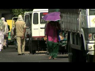 Policeman scratches his butt on the Ring Road