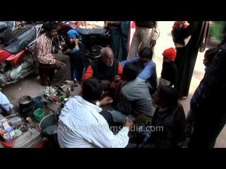Varanasi streets dentist in action