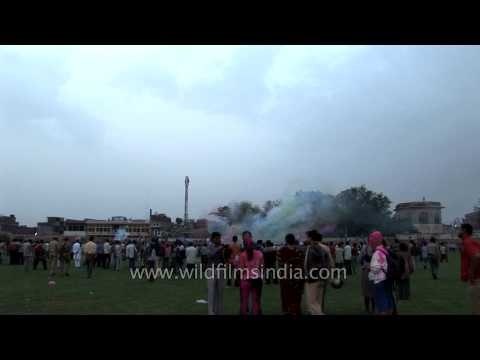 Tourists playing with color during Holi festival in Jaipur