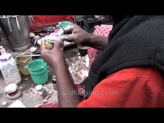 Denture being prepared by roadside dentist- Varanasi