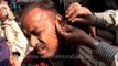 Roadside ear wax cleaning in India