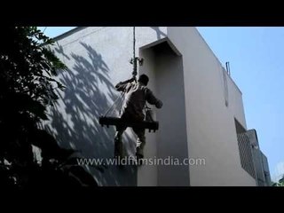 How a building gets painted in India!