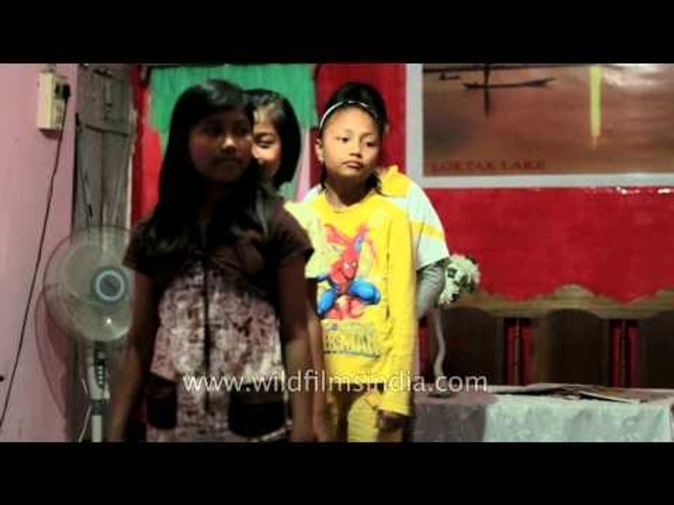 Manipuri dance teacher teaching her students