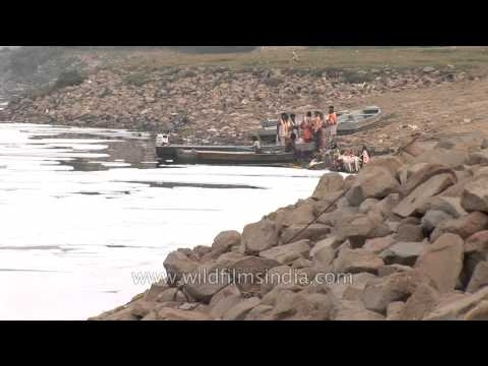 Polluted Yamuna river covered in foam
